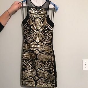 BEBE Black & Gold sequin mini dress